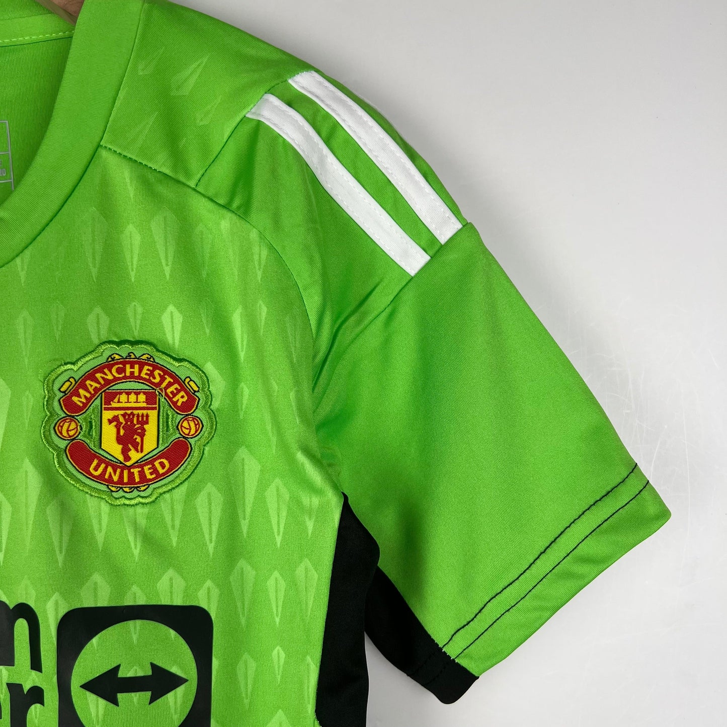 MANCHESTER UNITED PORTERO I 23/24 KIT PARA NIÑOS