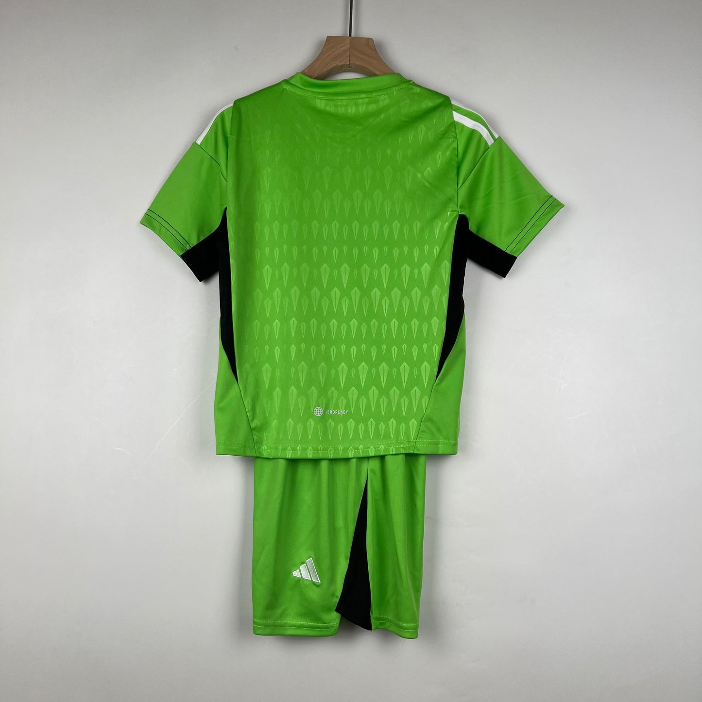 MANCHESTER UNITED PORTERO I 23/24 KIT PARA NIÑOS