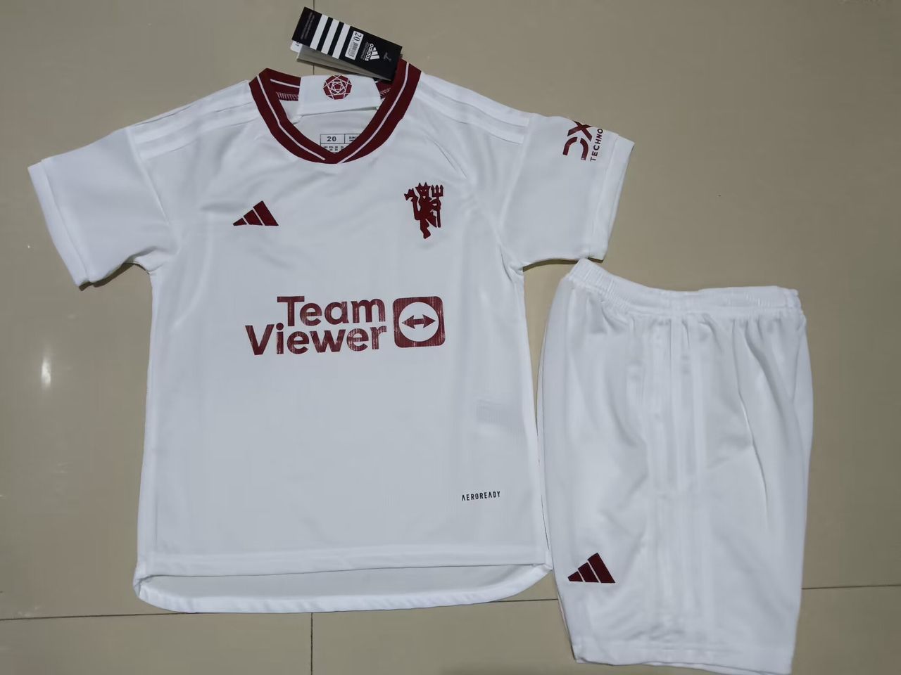 MANCHESTER UNITED II 23/24 KIT PARA NIÑOS