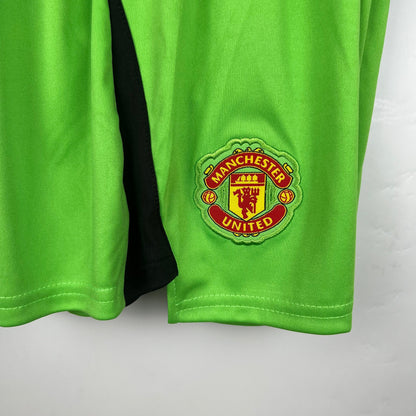 MANCHESTER UNITED PORTERO I 23/24 KIT PARA NIÑOS