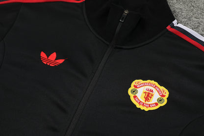 MANCHESTER UNITED CHANDAL 24/25 - UNISEX/UNISEX - NEGRO