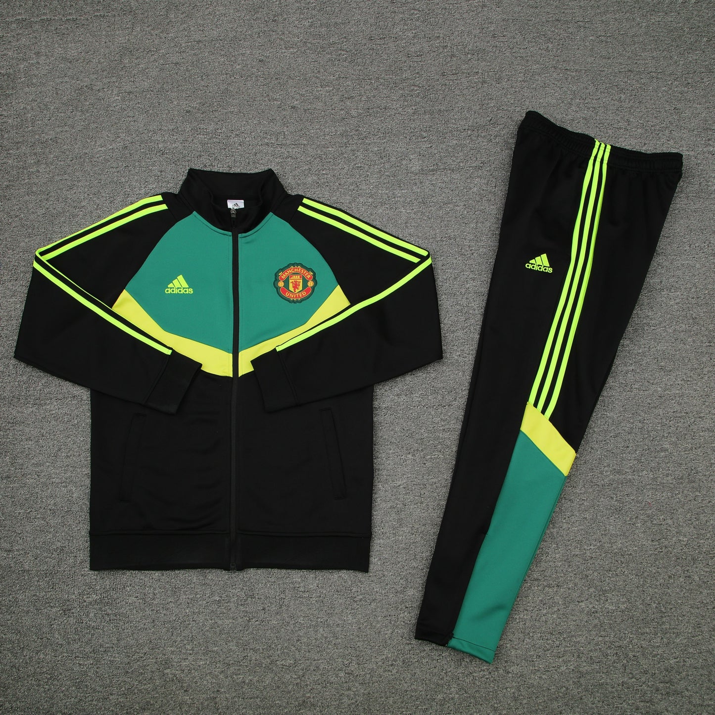 MANCHESTER UNITED CHANDAL 24/25 - UNISEX/UNISEX - VERDE E NEGRO