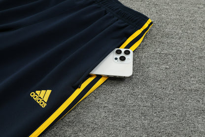 REAL MADRID  CHANDAL 24/25 - UNISEX/UNISEX - PÚRPURA Y NEGRO